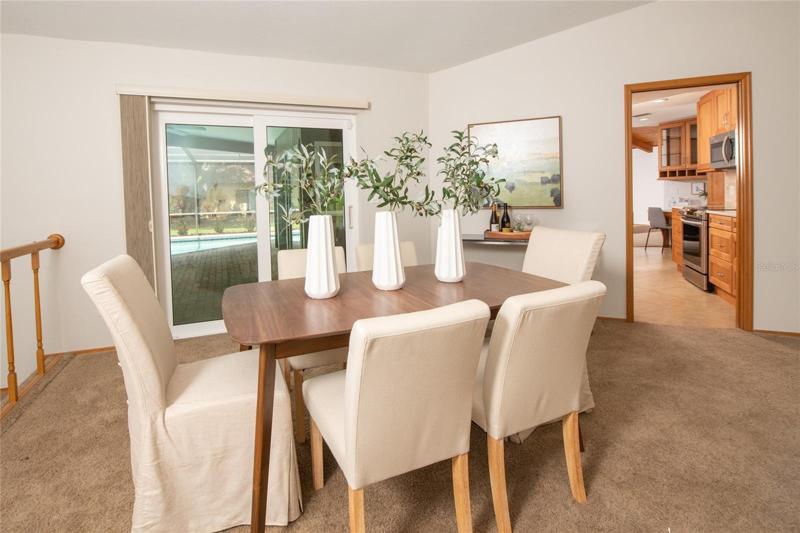 Formal dining but  dining room off  sliding doors opens to the lanai and porch.