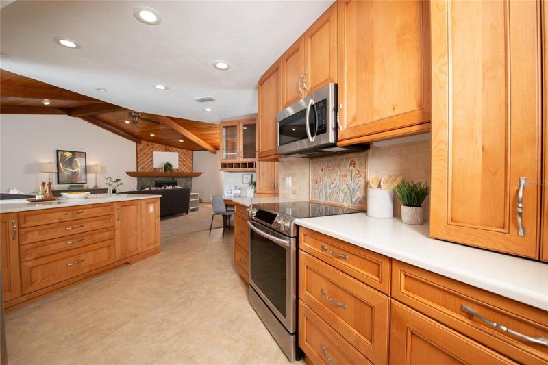Updated kitchen opens to the family room area.