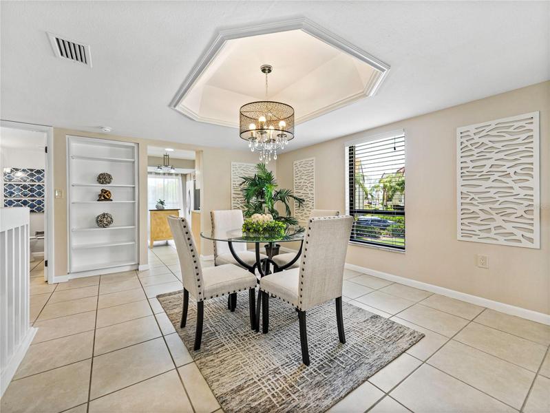 You can just see the half bath off to the left and the kitchen though the opening to the left. It is very convenient for serving!