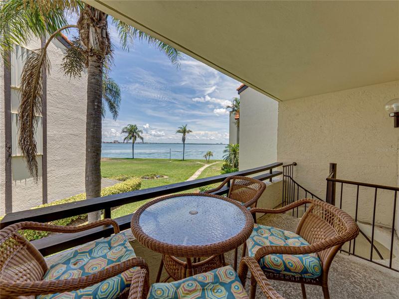 The living room balcony has a lovely view and enjoys privacy.