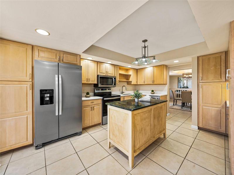 The stainless steel refrigerator, microwave and range are all brand new!