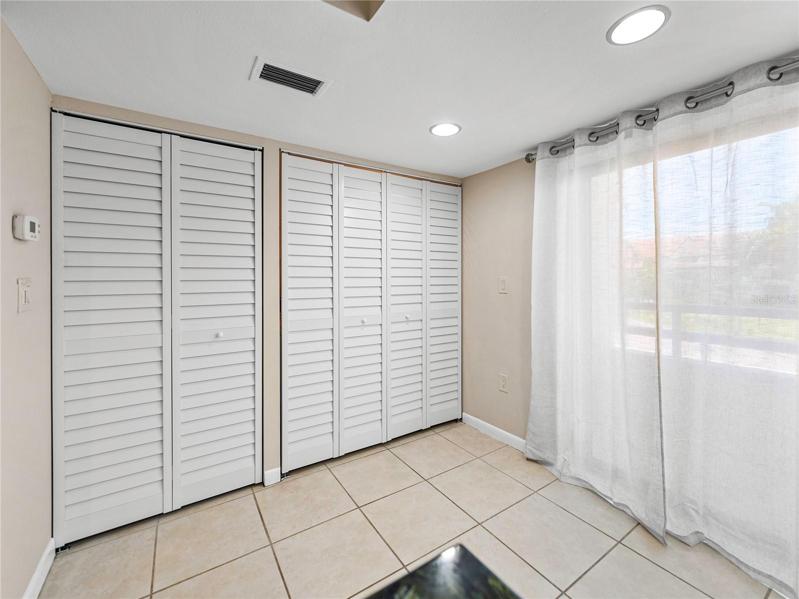 Behind these doors is storage and a washer and dryer!