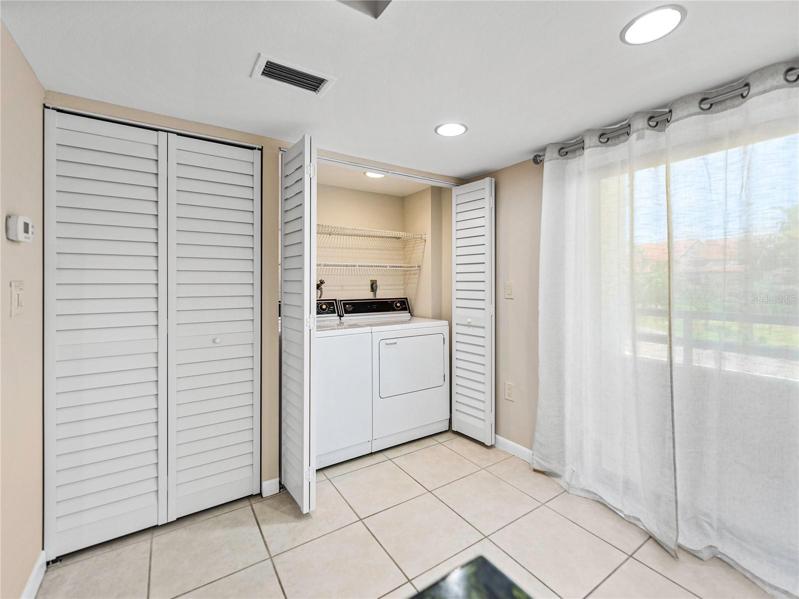 Voila! How convenient is this to have your full-size washer and dryer tucked away in your kitchen?