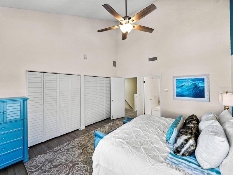 The stylish bedroom furnishings convey. This includes the bed, headboard, dresser & night stands. (Other items are staged.)