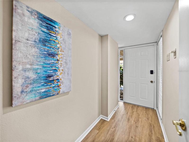 This is the foyer at the front door. The foyer is almost 16' deep and 3.5' wide.