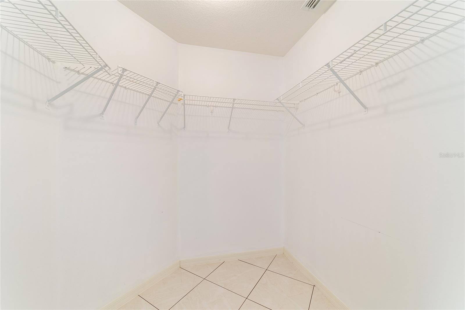 Walk-in closet in Master.