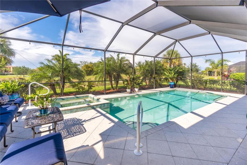 Lanai overlooking the pool with golf course view