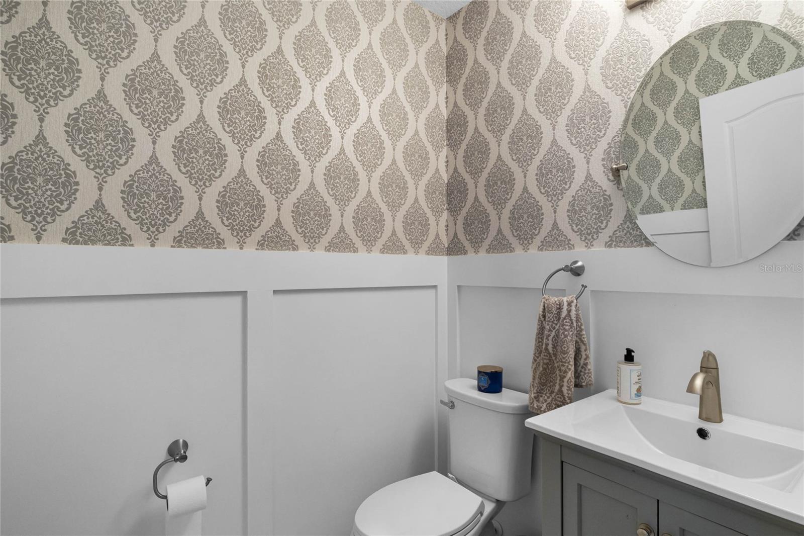 Remodeled Powder Bath with Custom Wallpaper, New vanity, Wainscoting &amp; Marble Floors