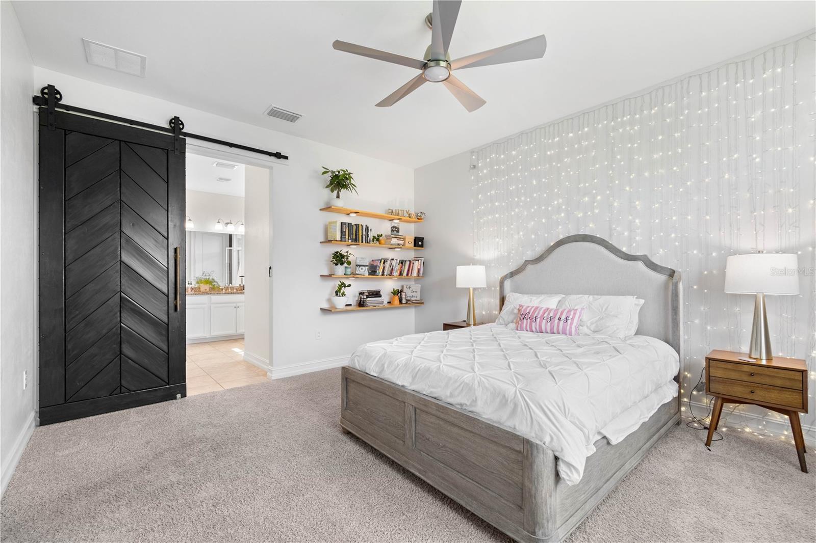 Master Bedroom with barndoor to Master Bathroom
