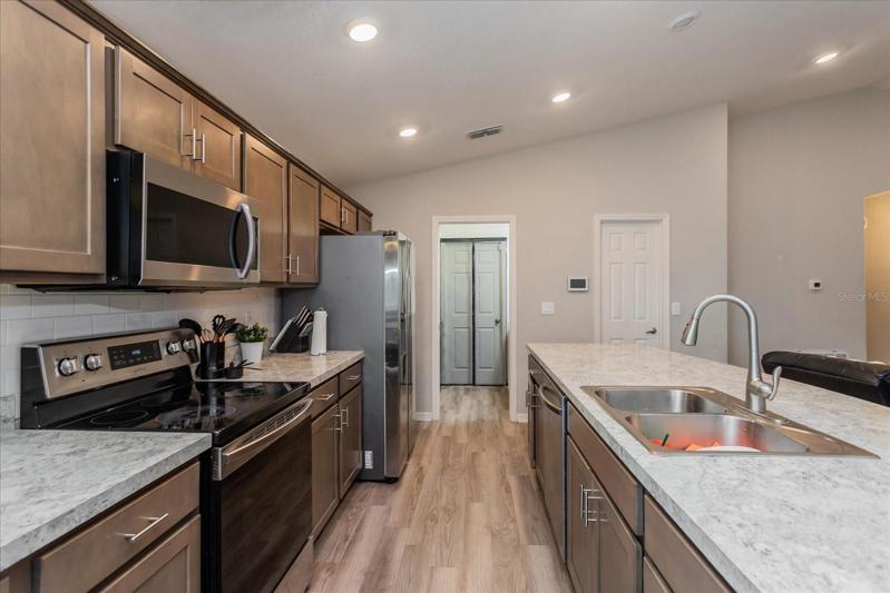 Spacious kitchen with appliances