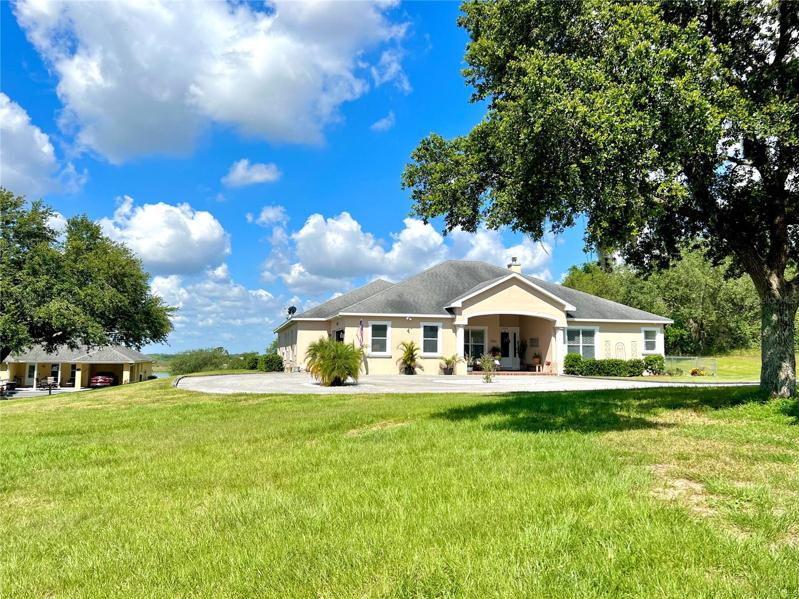 Lovely estate property w/ 2 single family homes on the lake!