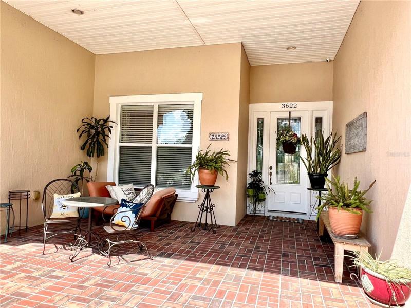 Inviting front porch of main residence