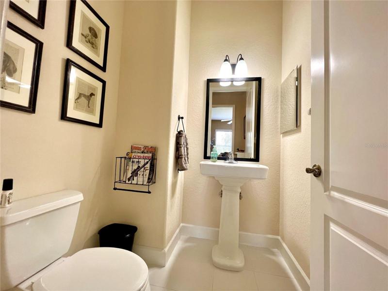 Half bath near office & handy to formal areas
