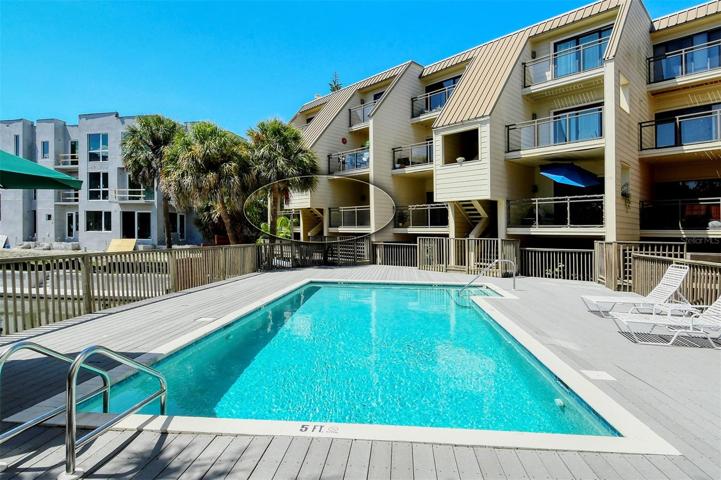 Ground floor unit overlooking the pool, dock, kayaks, and Hudson Bayou.