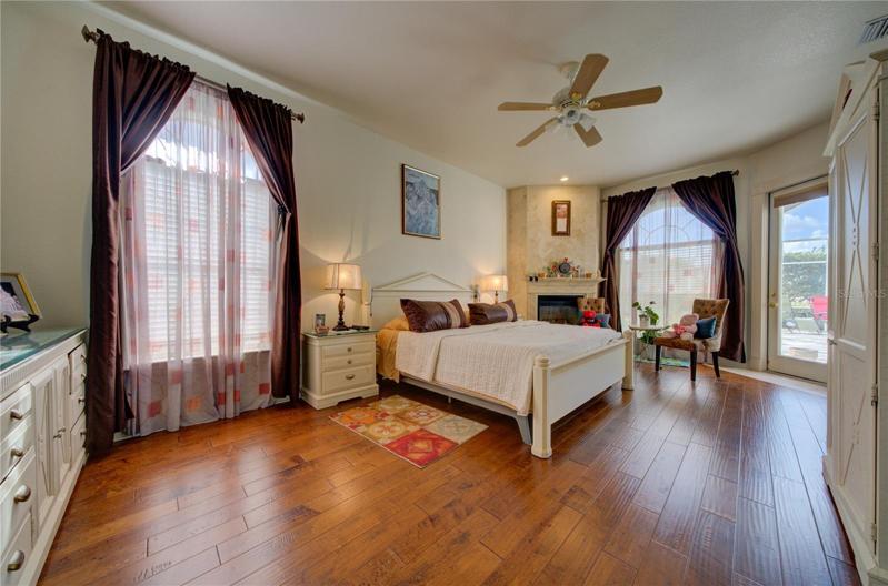 Primary Bedroom with access to the pool