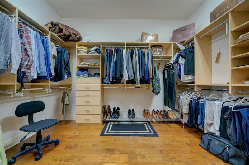 Primary Bedroom walk-in closet