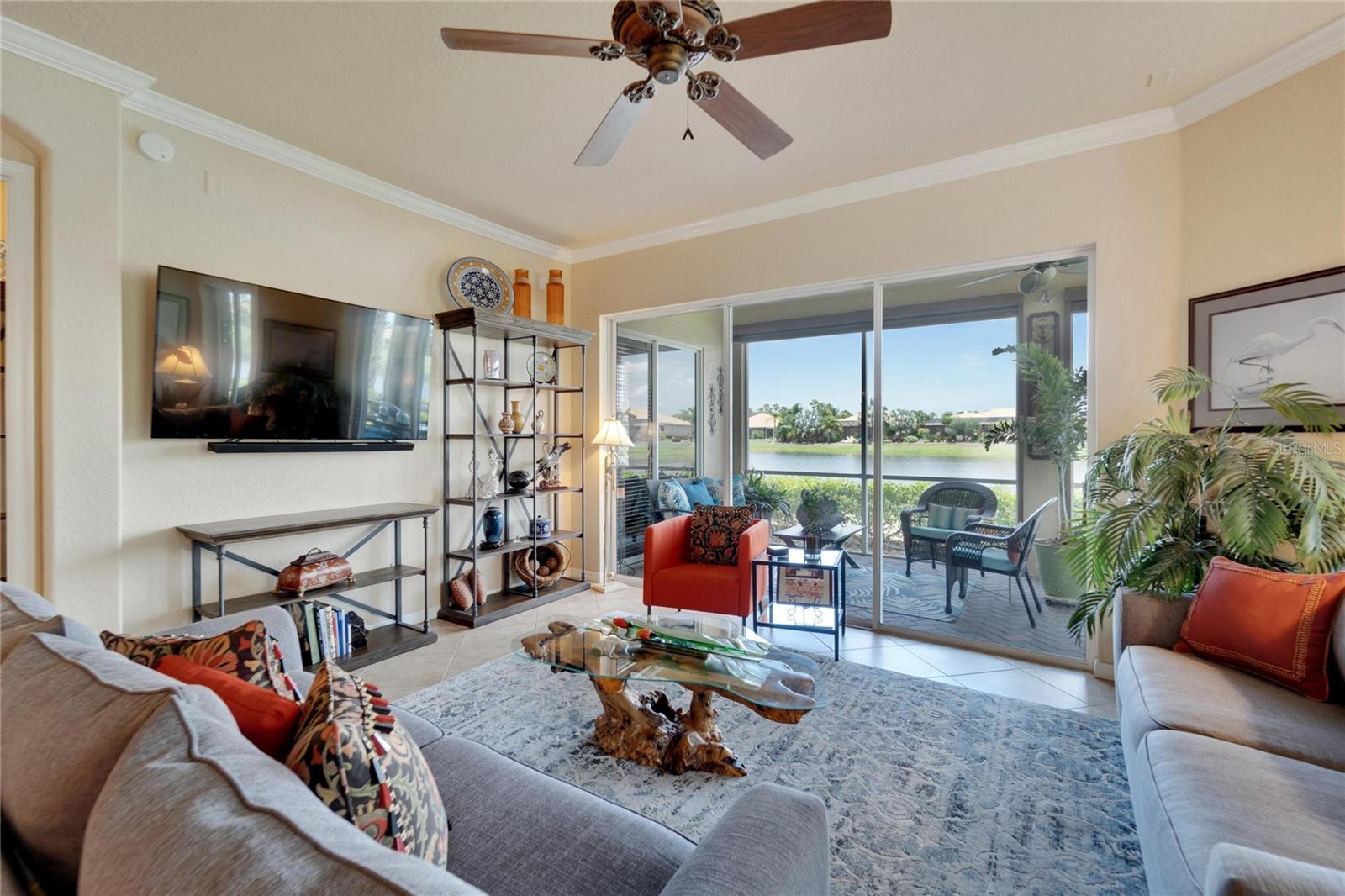 View of living room and overlooking the sparking private pond.