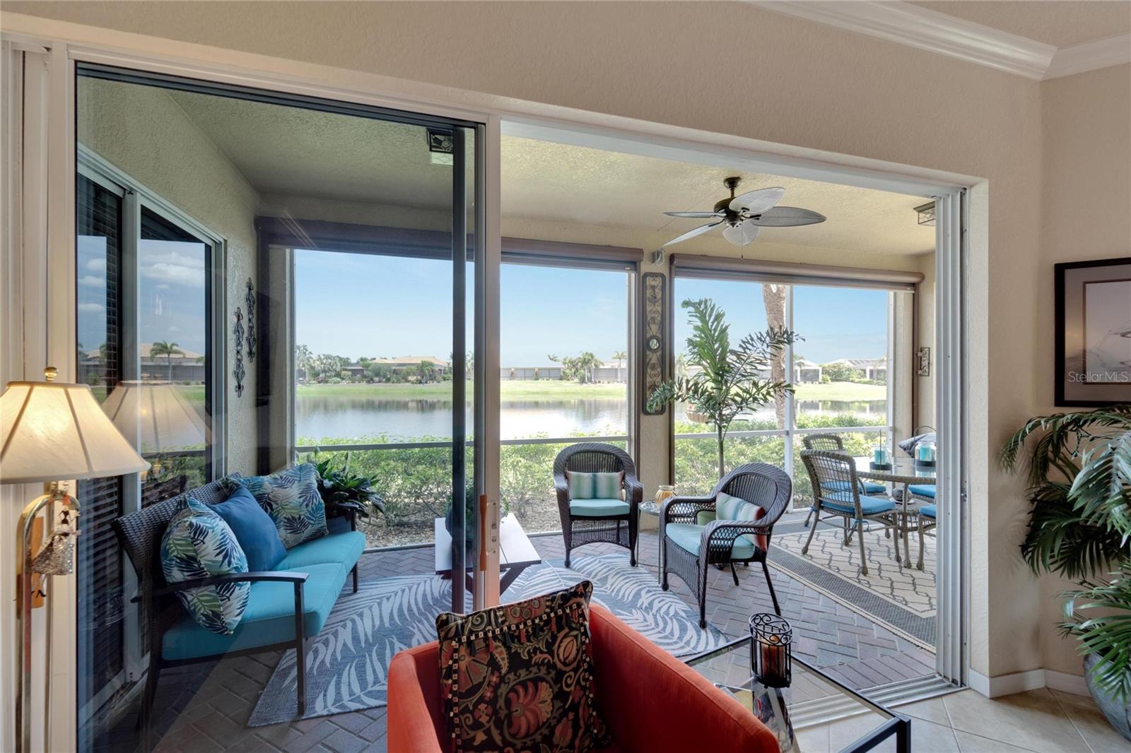 Bring the outdoors in, when living in this condo. A beautiful open living floor plan offers views from every room throughout the home. Three paned sliding glass doors easily open up to overlook a large pond water view.