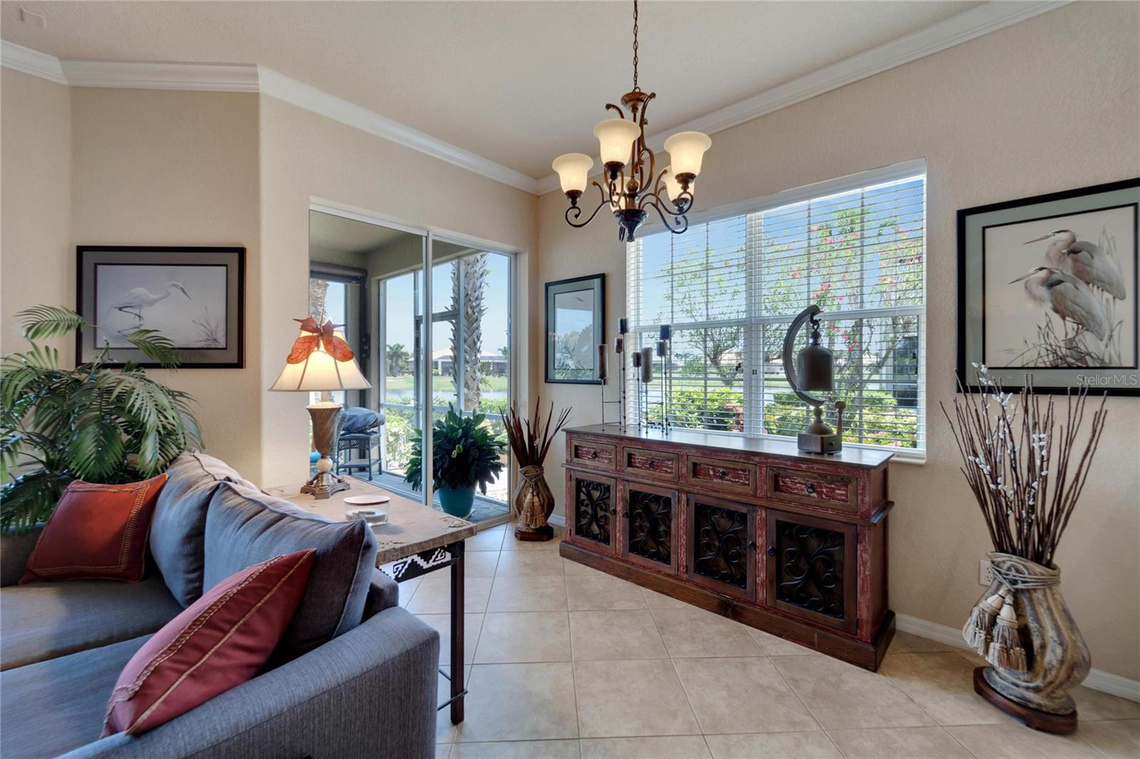 Extra large windows offers ample lighting and an open feel in this add on space to the living room which can be easily made another dinette area.
