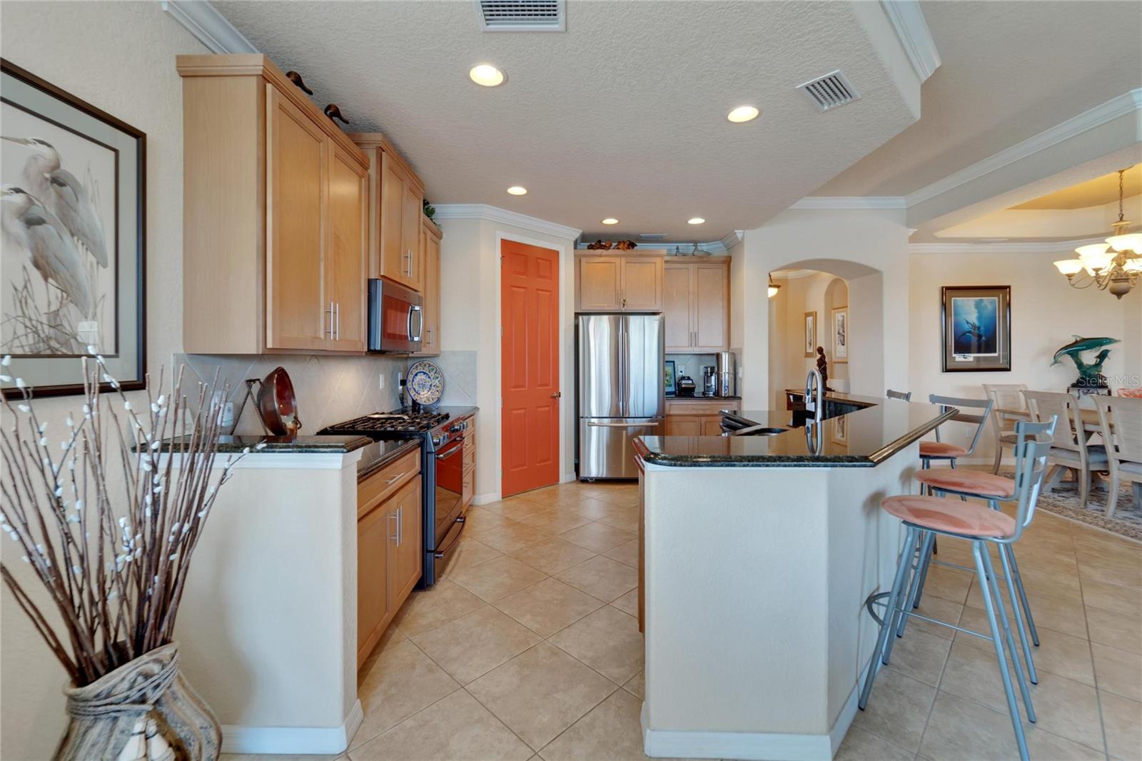 Another view from the dinette area overlooking the open spacious kitchen and living room areas.