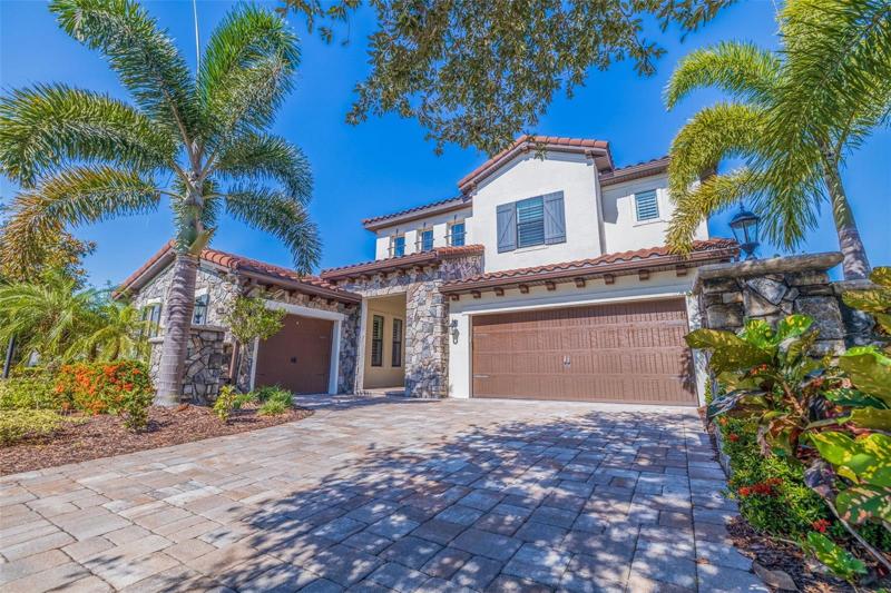 Welcome to 7616 Haddington Cove, nestled in Country Club East in Lakewood Ranch
