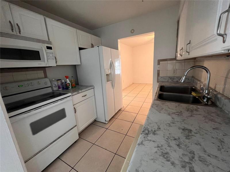 Bathroom with laundry Hookups.  Easy to add shower or tub.