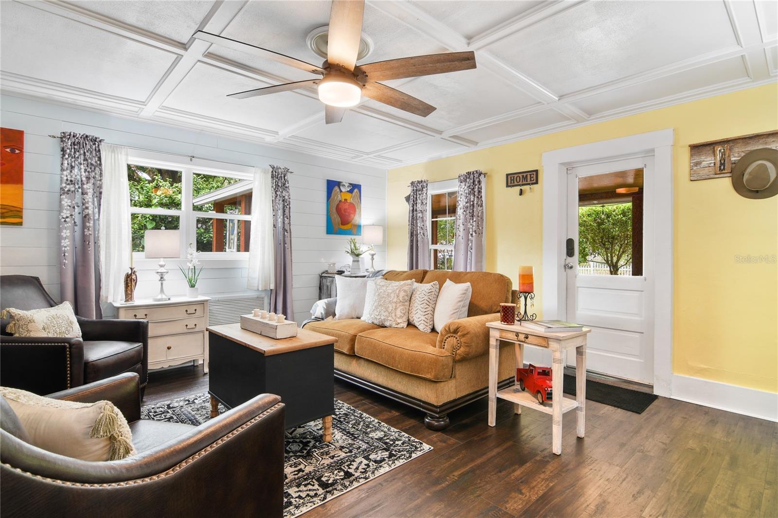 This view of the living room and front door