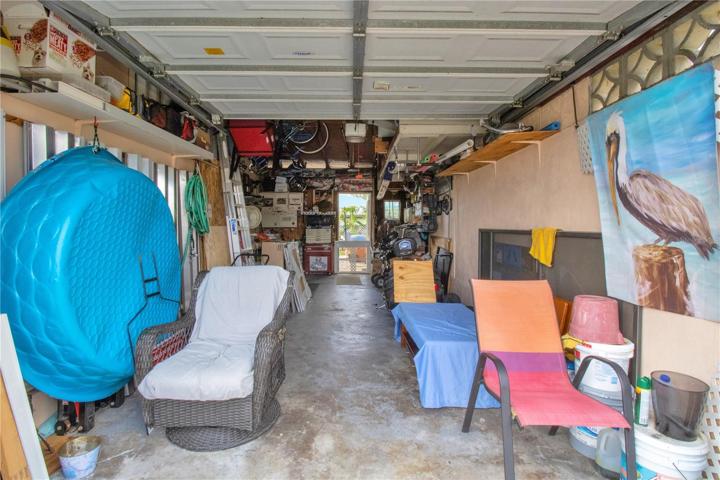 Deep garage with a workshop