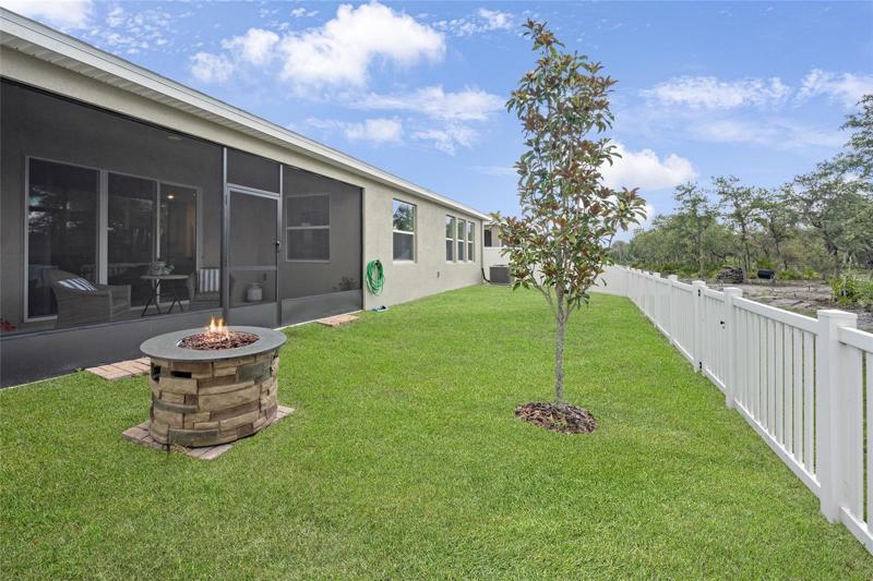 Fenced yard with fire pit