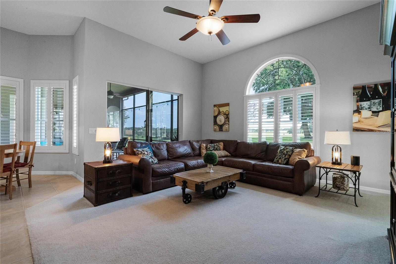 Tinted Slider Doors leading to large Covered Lanai