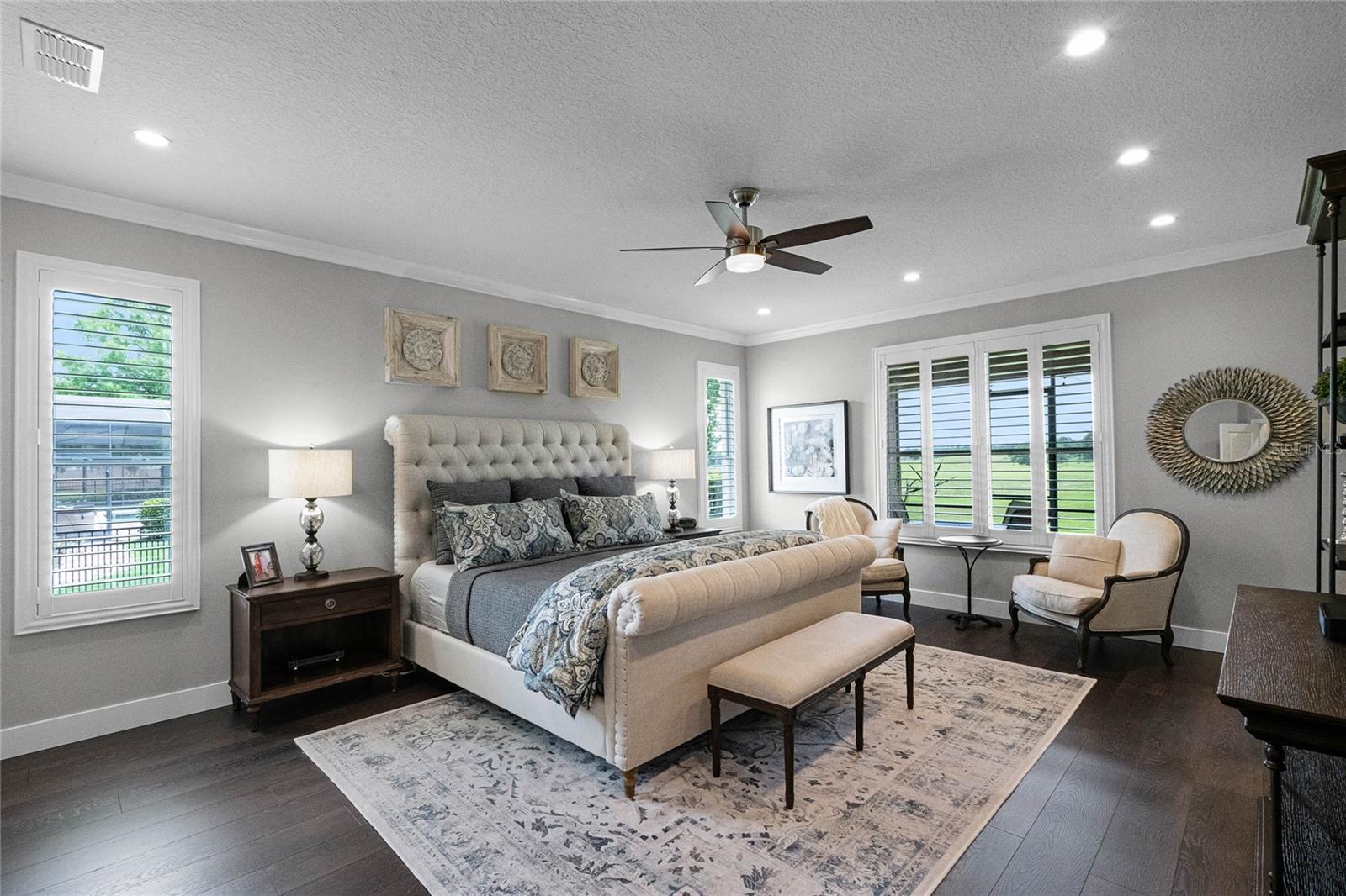 PRIMARY BEDROOM, NEW ENGINEERED HARDWOOD FLOORING, RECESSED LIGHTING, SUNBURST PLANTATION SHUTTERS