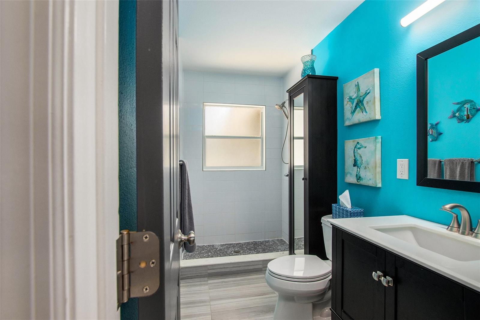 Updated bathroom with walk in shower.