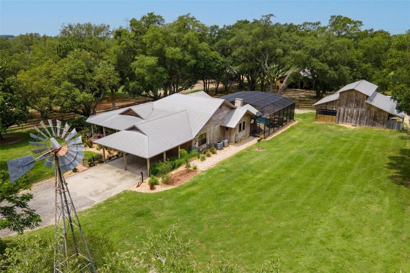 Aerial of Side Exterior and Backyard Area