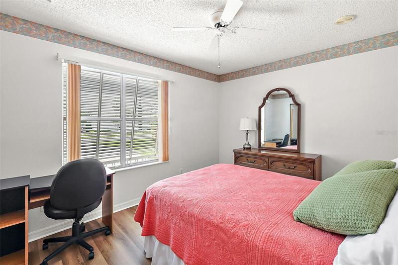 Bedroom 2 w/luxury vinyl plank flooring