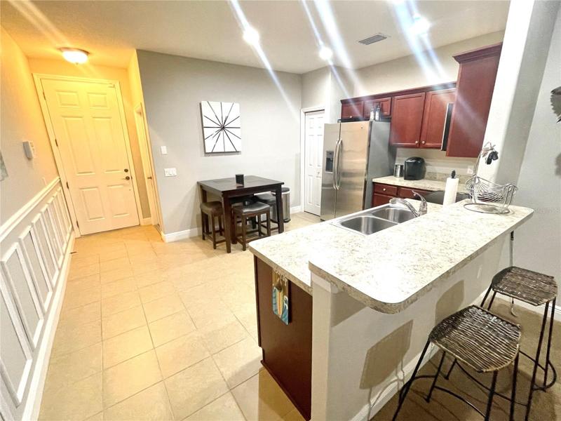 Breakfast bar open to the dining/living room