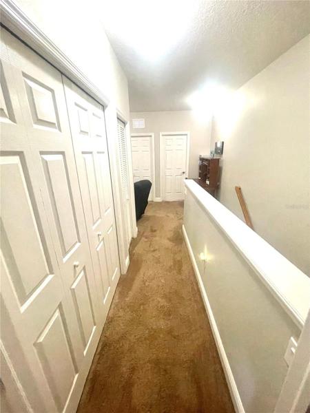 Laundry closet to the left