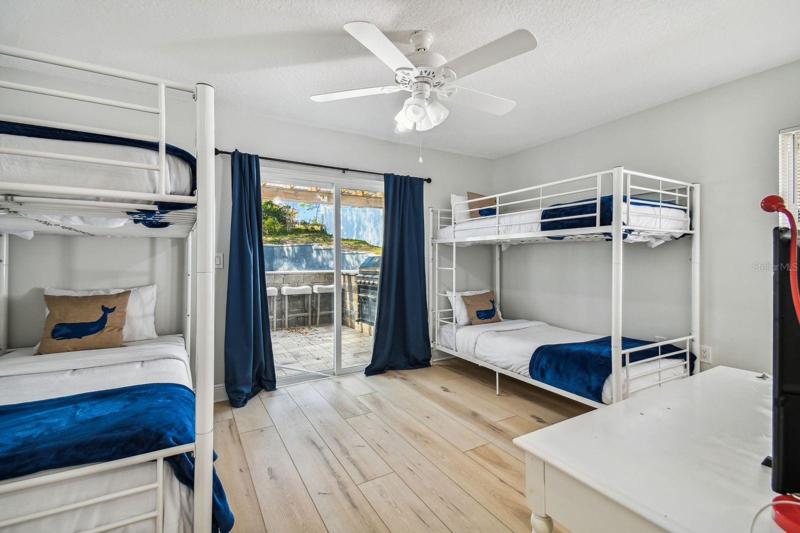 bedroom opens to the back yard