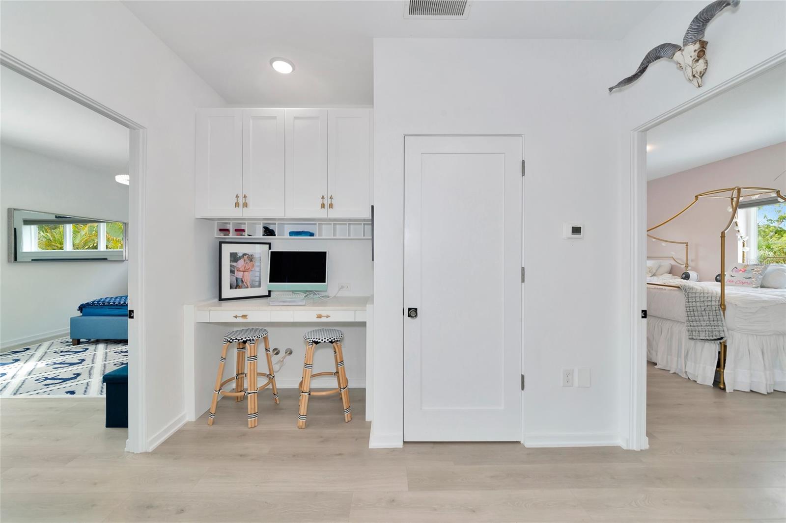 Custom desk and built ins in loft- also full rough in for wet bar