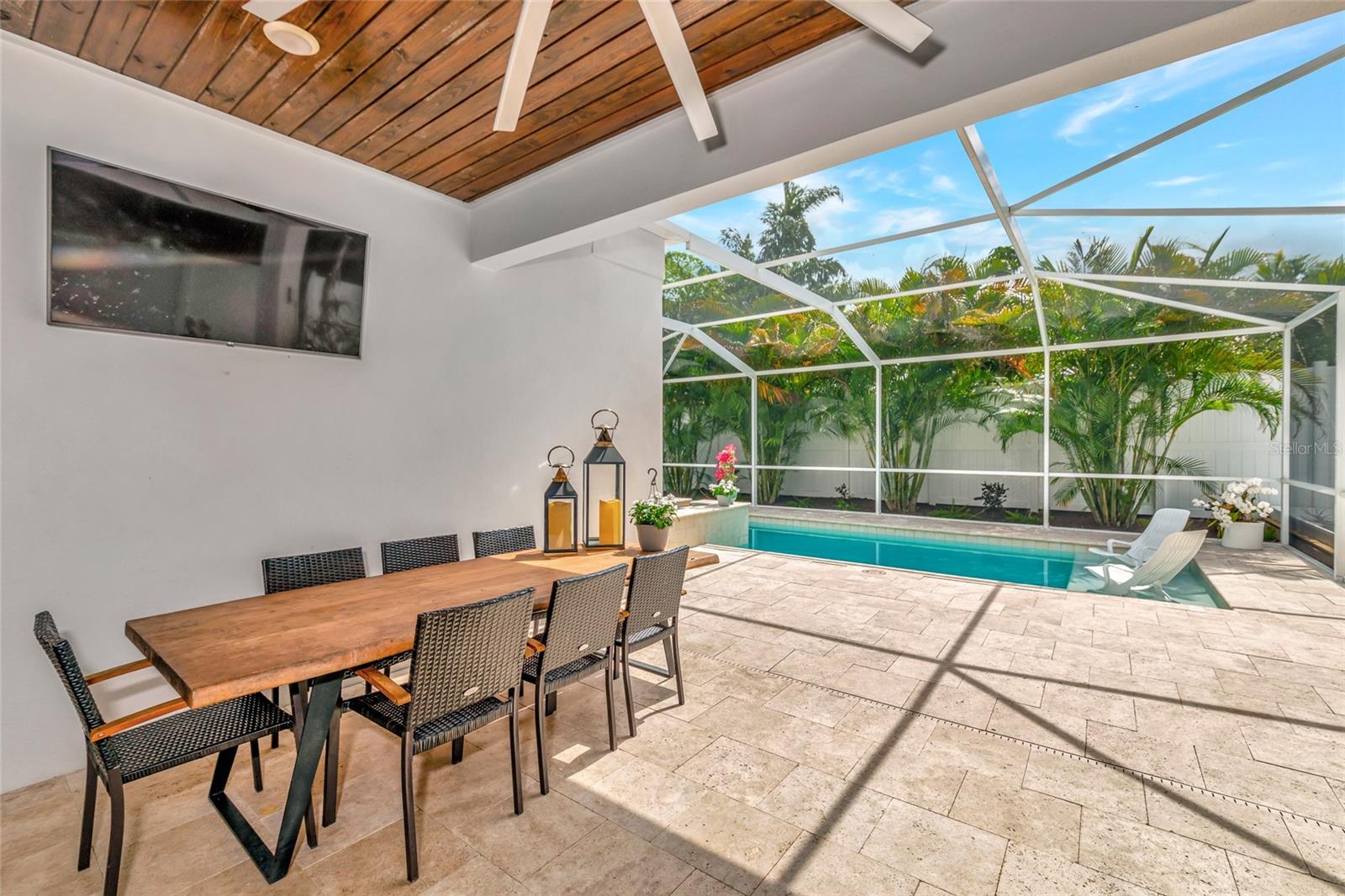 Exterior with oversized Fan and large flat screen