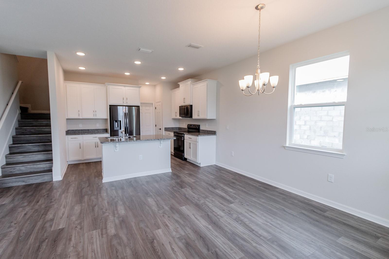 Interior photos are of a different property, same model.  This home has similar finishings.