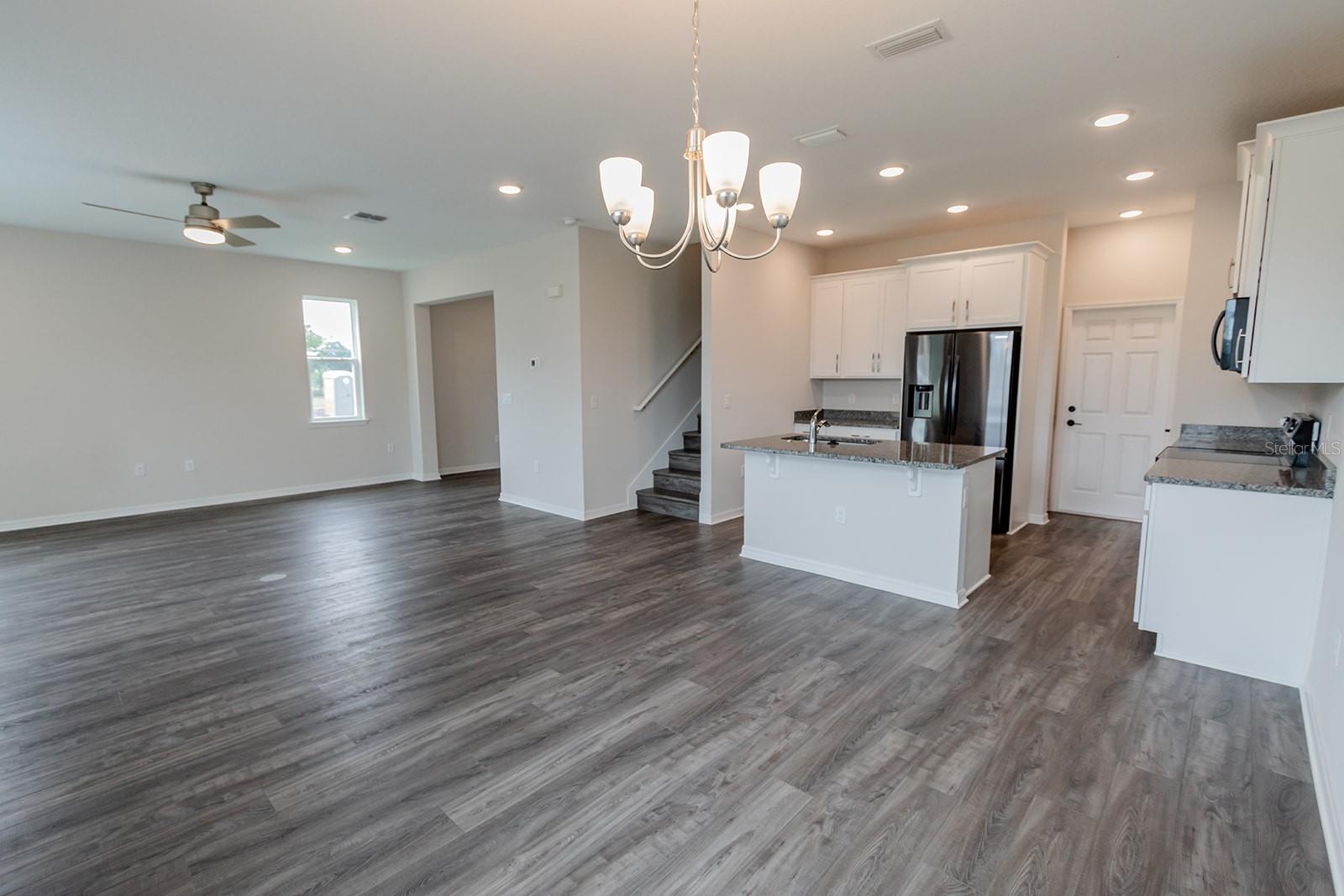 Interior photos are of a different property, same model.  This home has similar finishings.