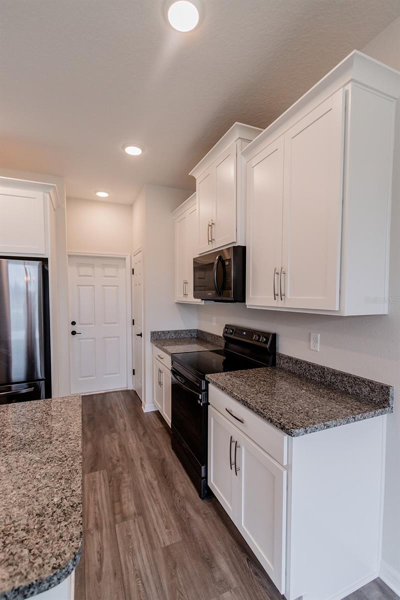 Interior photos are of a different property, same model.  This home has similar finishings.