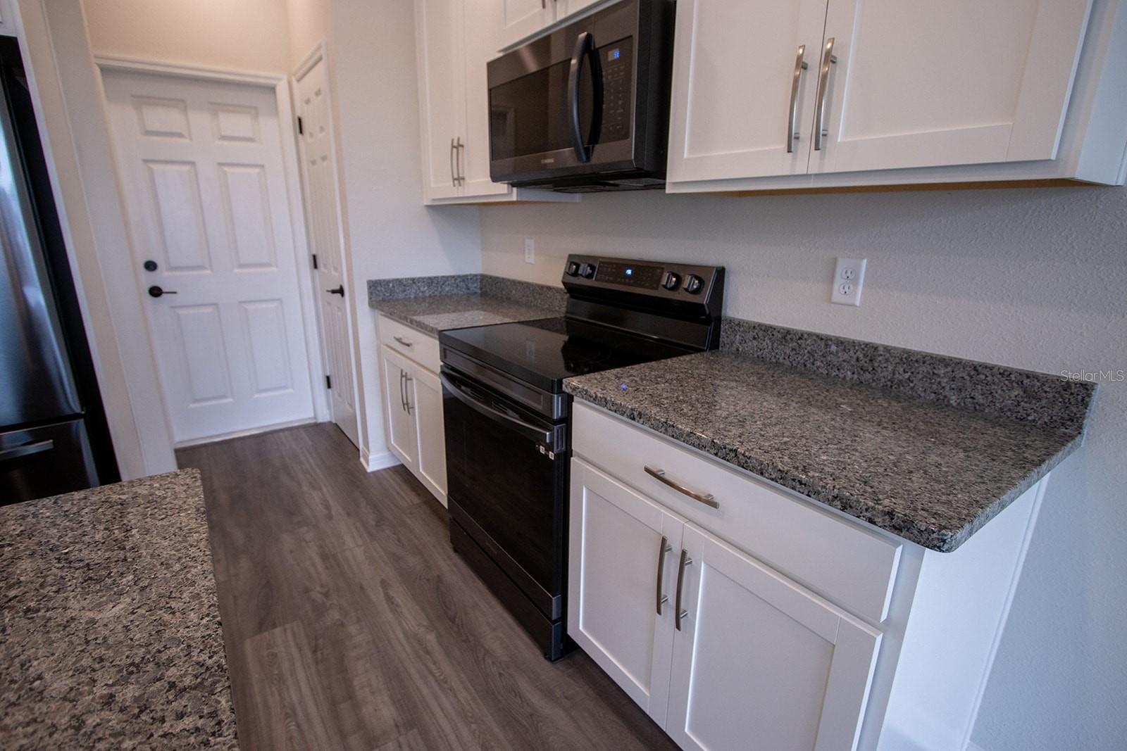 Interior photos are of a different property, same model.  This home has similar finishings.