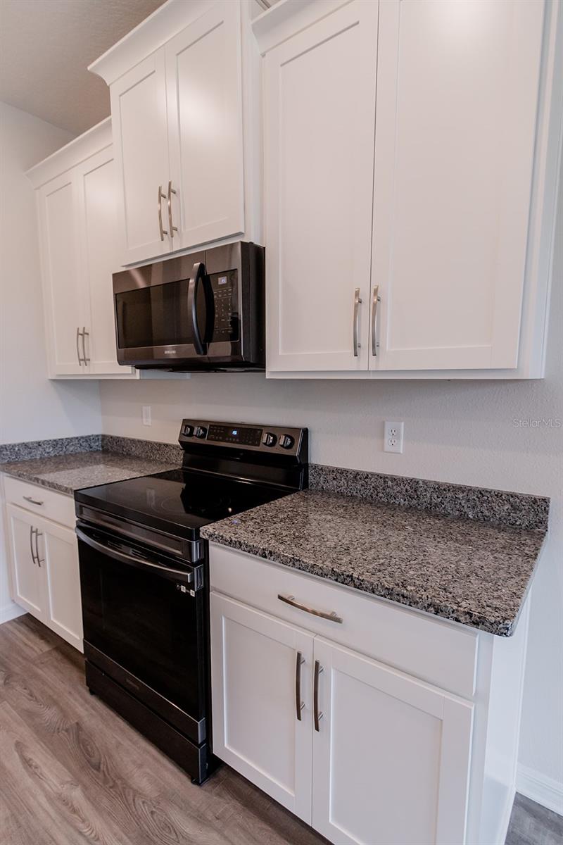 Interior photos are of a different property, same model.  This home has similar finishings.