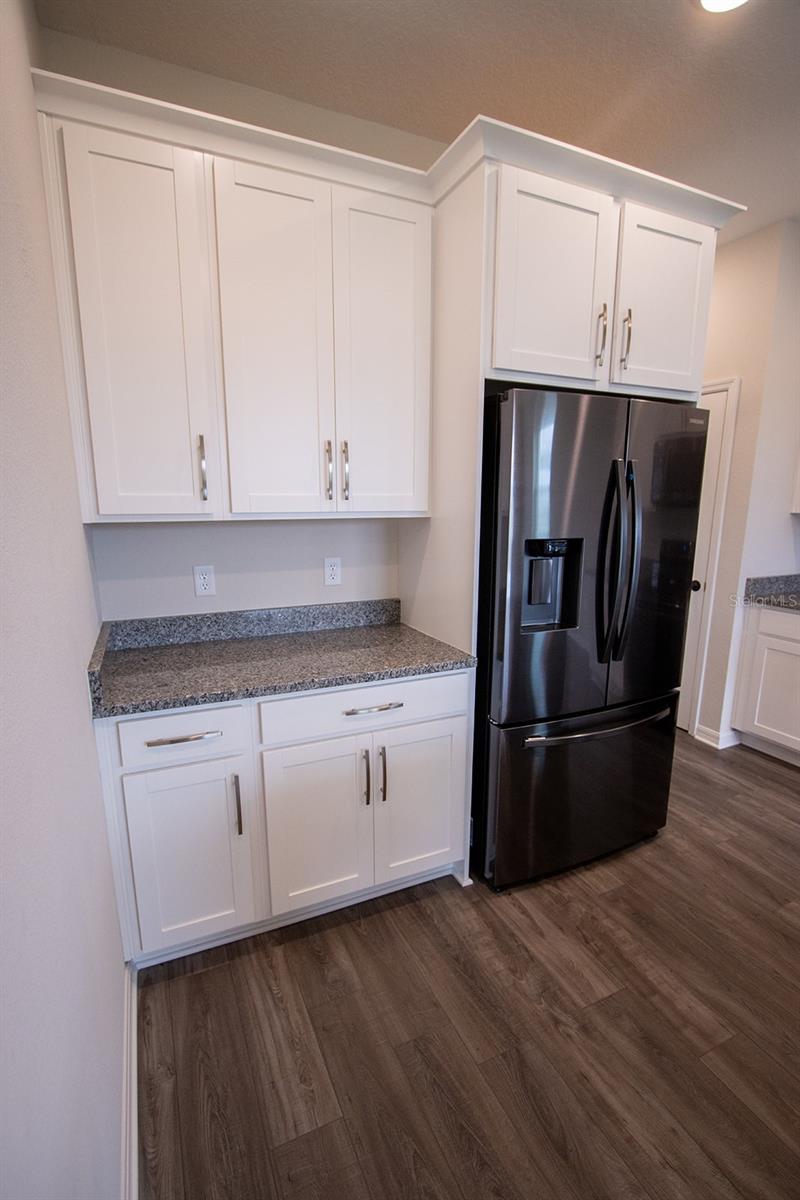 Interior photos are of a different property, same model.  This home has similar finishings.