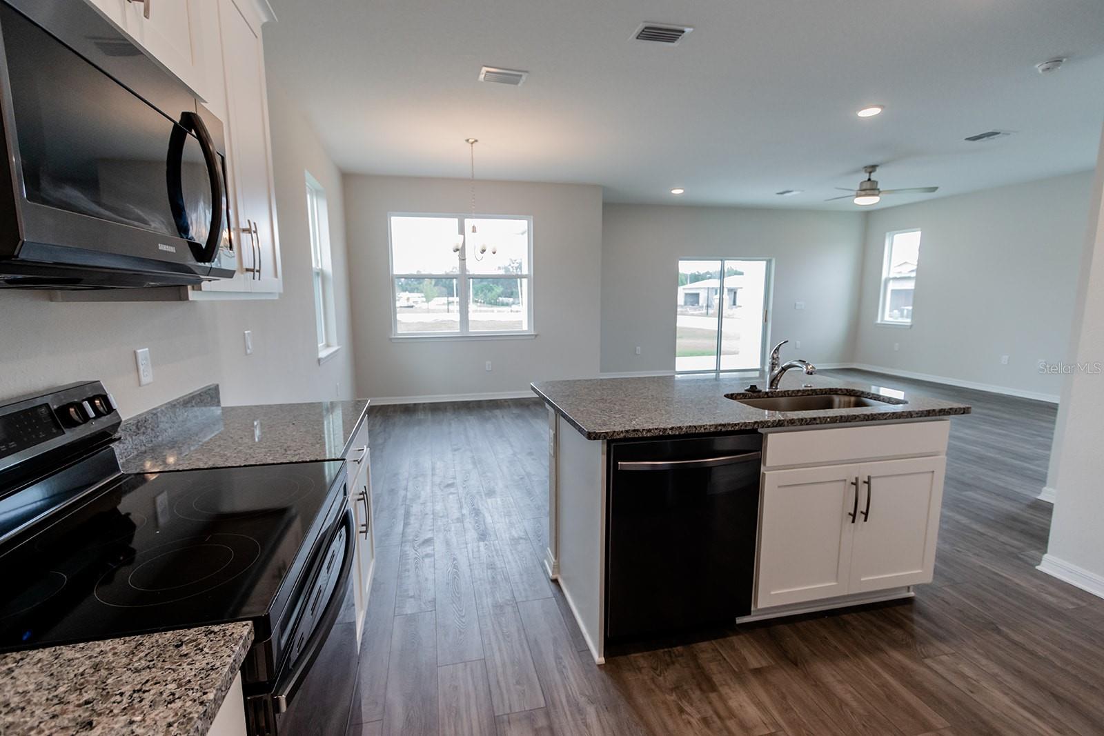 Interior photos are of a different property, same model.  This home has similar finishings.