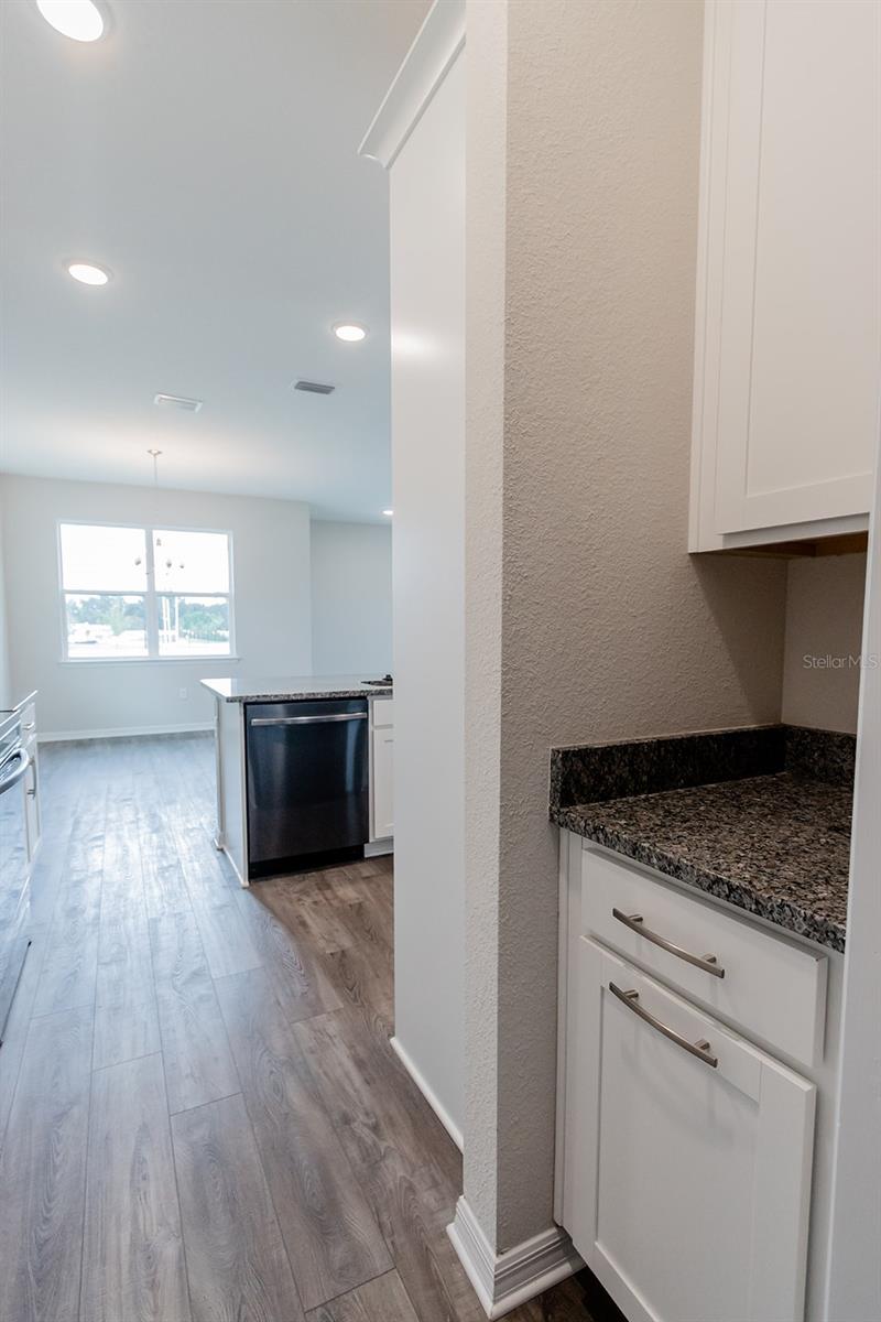 Interior photos are of a different property, same model.  This home has similar finishings.