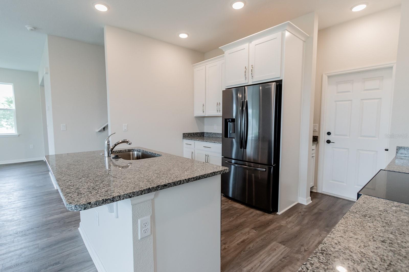 Interior photos are of a different property, same model.  This home has similar finishings.