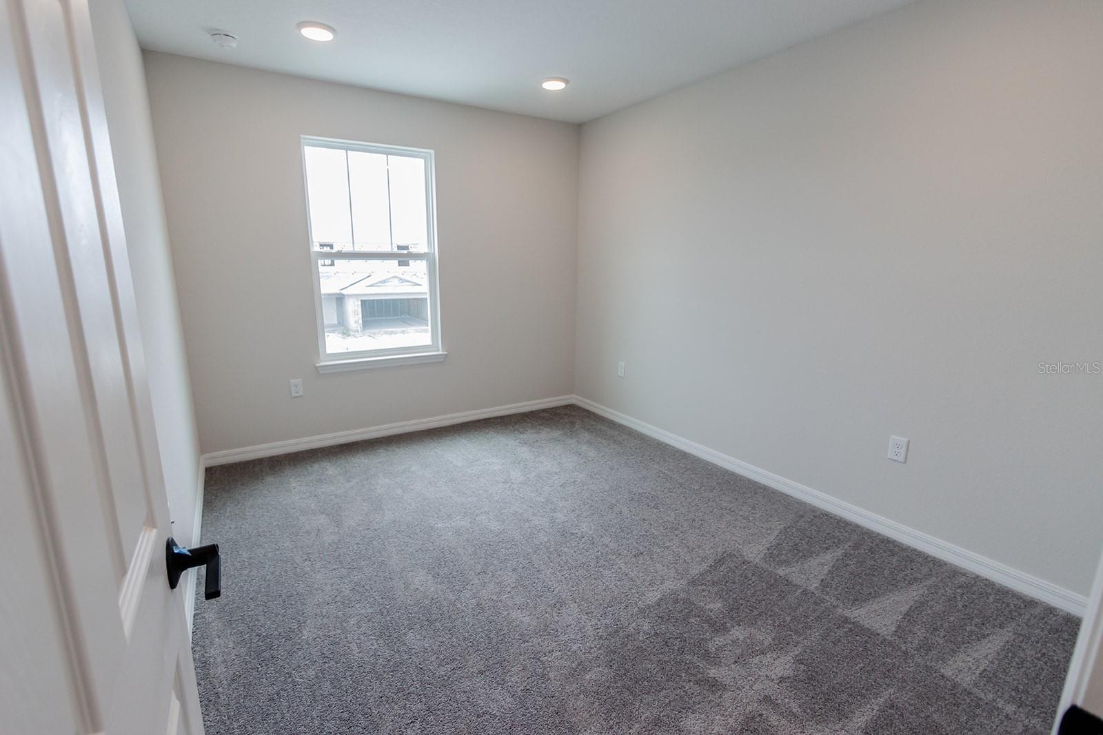 Interior photos are of a different property, same model.  This home has similar finishings.