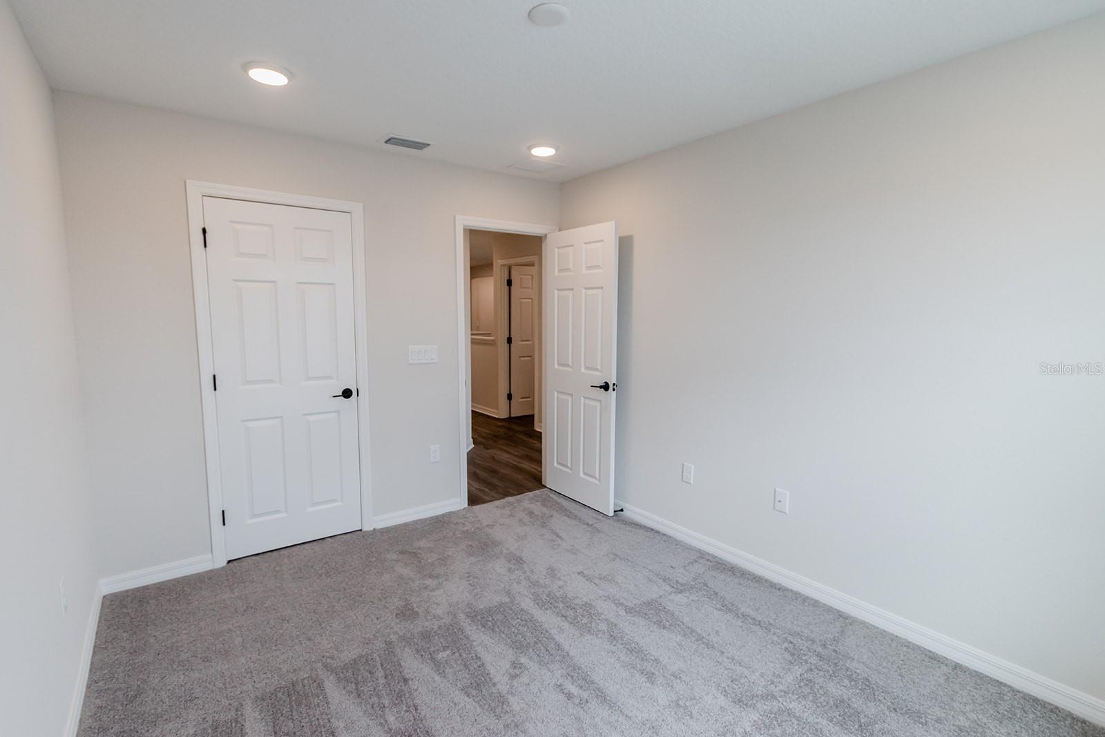 Interior photos are of a different property, same model.  This home has similar finishings.